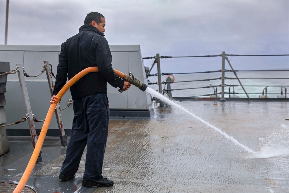 Fresh-water washdown aboard the USS Bulkeley