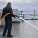 Fresh-water washdown aboard the USS Bulkeley