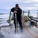 Fresh-water washdown aboard the USS Bulkeley