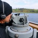 U.S. Nay Sailor verifies visual contacts aboard the USS Bulkeley