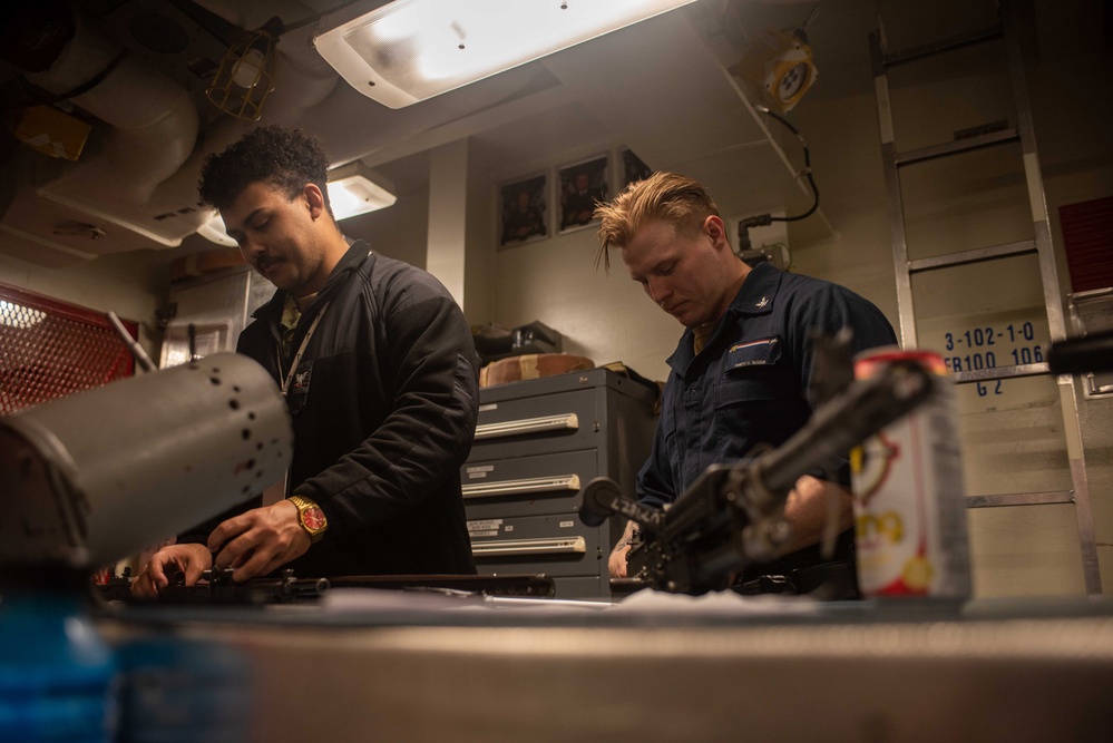 USS Ronald Reagan (CVN 76) Sailors perform weapon inspections