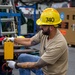 USS Ronald Reagan (CVN 76) Sailors, contractors and Puget Sound Naval Shipyard workers conduct routine operations and ship maintenance