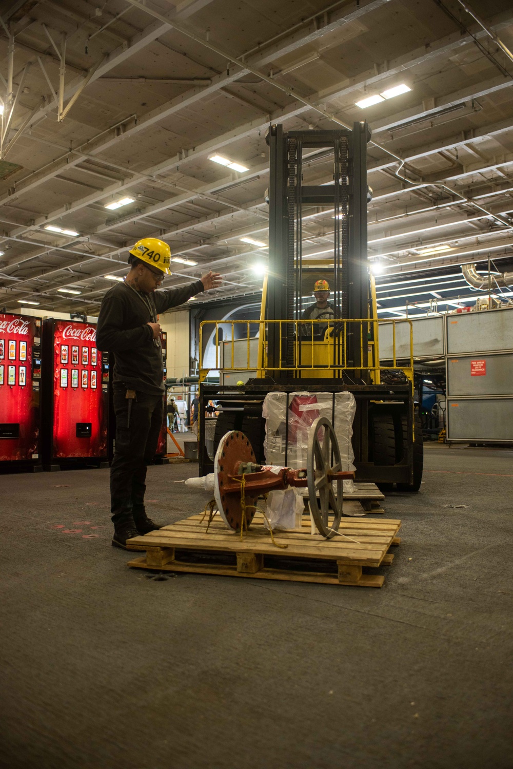 PSNS workers perform maintenance aboard USS Ronald Reagan (CVN 76)