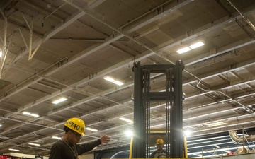 PSNS workers perform maintenance aboard USS Ronald Reagan (CVN 76)