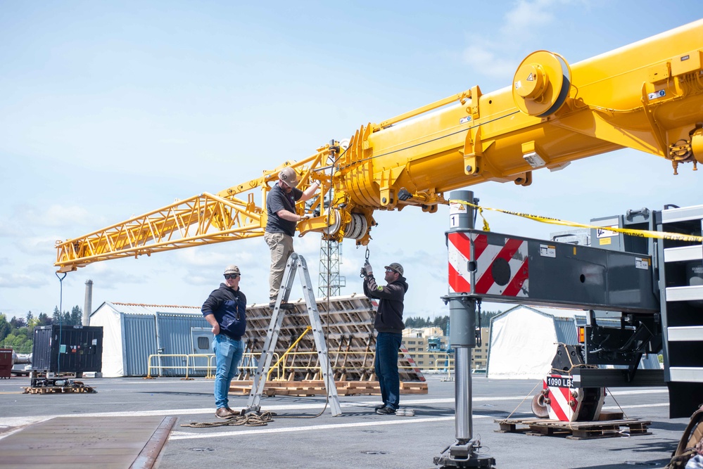 PSNS workers perform maintenance aboard USS Ronald Reagan (CVN 76)