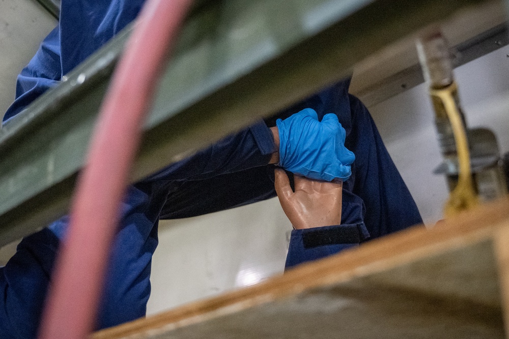 Ready Airmen enhance skills in fuel tank extraction exercise