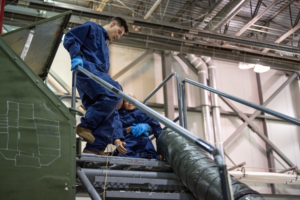 Ready Airmen enhance skills in fuel tank extraction exercise