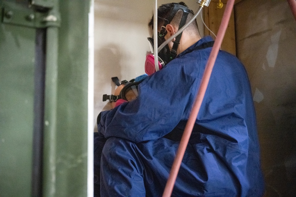 Ready Airmen enhance skills in fuel tank extraction exercise