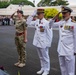 Leaders salute during Anzac Day ceremony in Nouméa