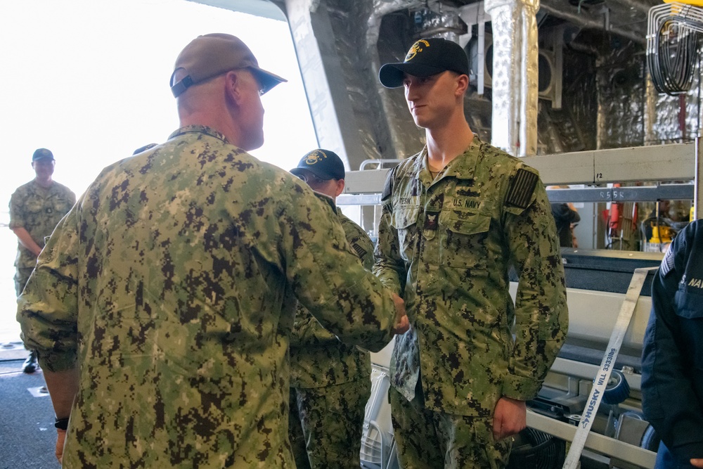 SWOBOSS visits USS Charleston
