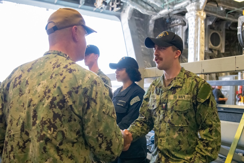 SWOBOSS visits USS Charleston