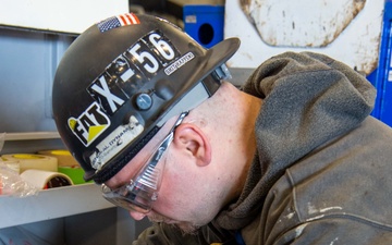 USS Ronald Reagan (CVN 76) contractors and Puget Sound Naval Shipyard (PSNS) workers conduct routine operations and ship maintenance.