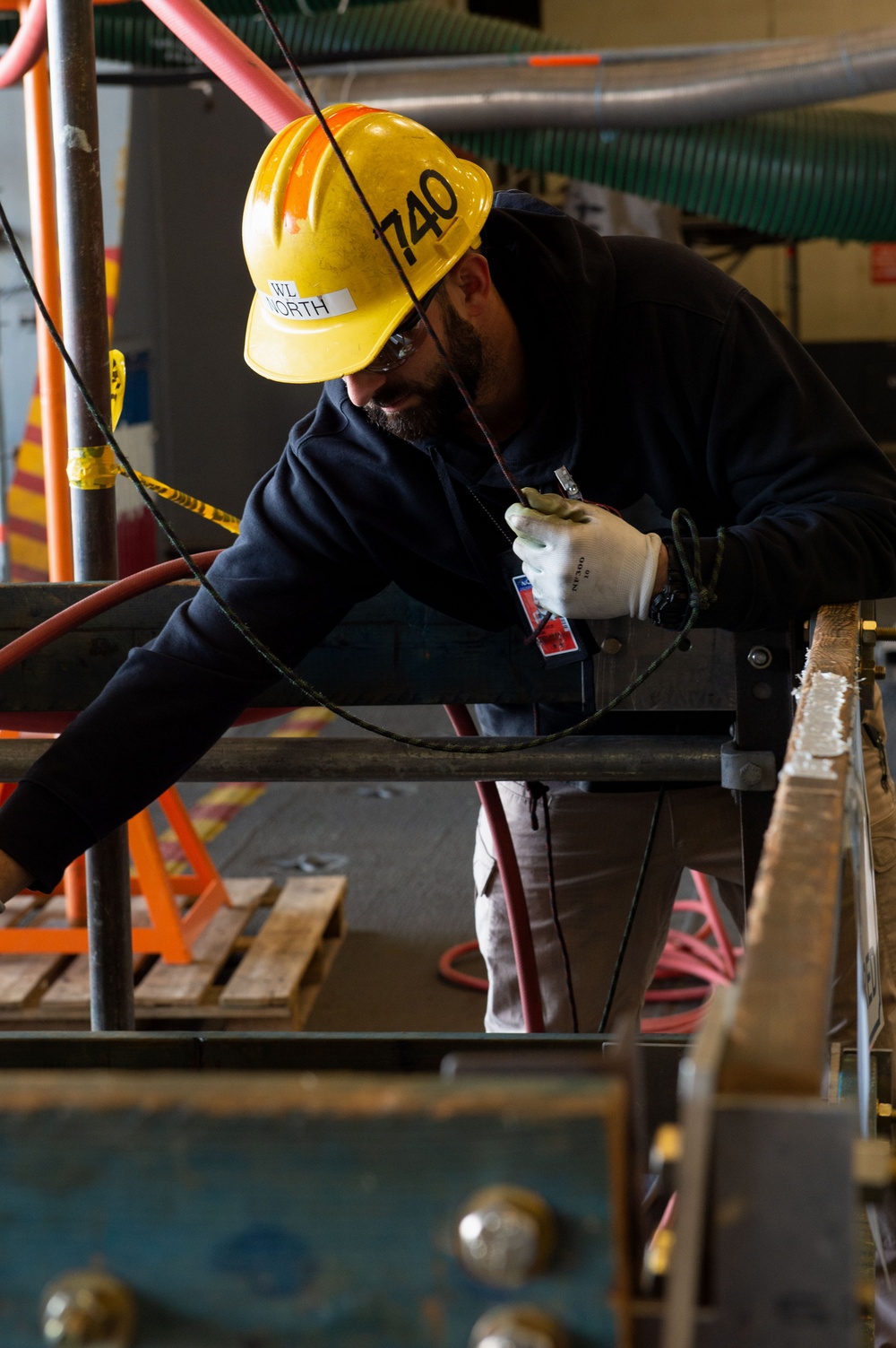 USS Ronald Reagan (CVN 76) contractors and Puget Sound Naval Shipyard (PSNS) workers conduct routine operations and ship maintenance.