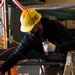 USS Ronald Reagan (CVN 76) contractors and Puget Sound Naval Shipyard (PSNS) workers conduct routine operations and ship maintenance.