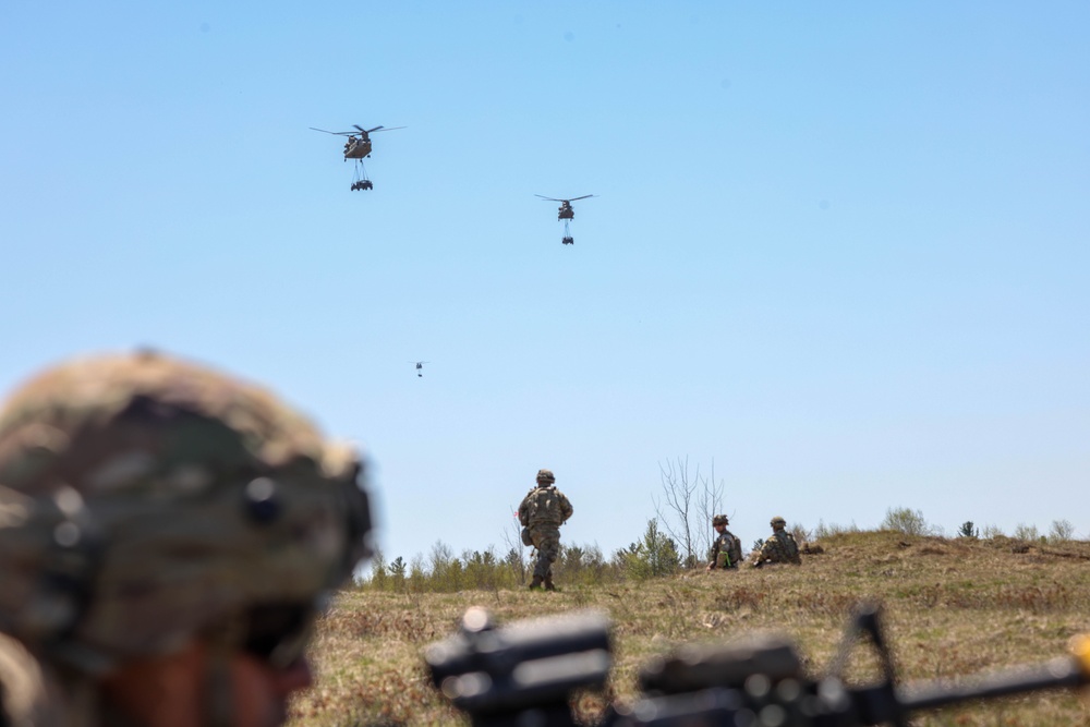 Soldiers Ready into Position as Aircraft and Vehicles Approach