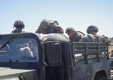 Soldiers Enter a 1 1/4 Ton Cargo Truck
