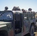 Soldiers Enter a 1 1/4 Ton Cargo Truck