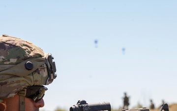 A Soldier Assumes a Prone Firing Position