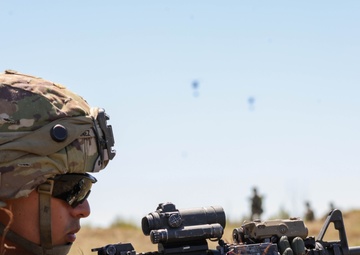 A Soldier Assumes a Prone Firing Position