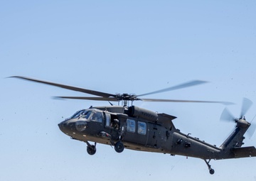 A UH-60 Blackhawk Helicopter Approaches a Landing Zone