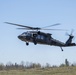 A UH-60 Blackhawk Helicopter Approaches a Landing Zone