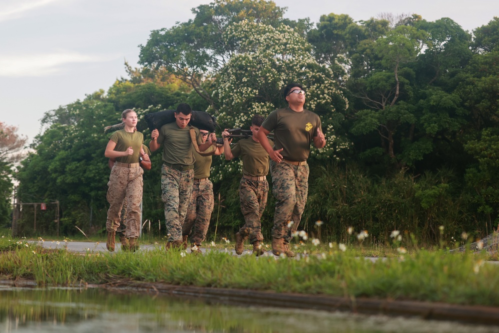 MASS-2 Marines run with M240B machine guns, equipment