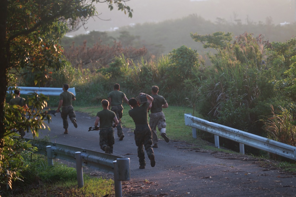 MASS-2 Marines run with M240B machine guns, equipment
