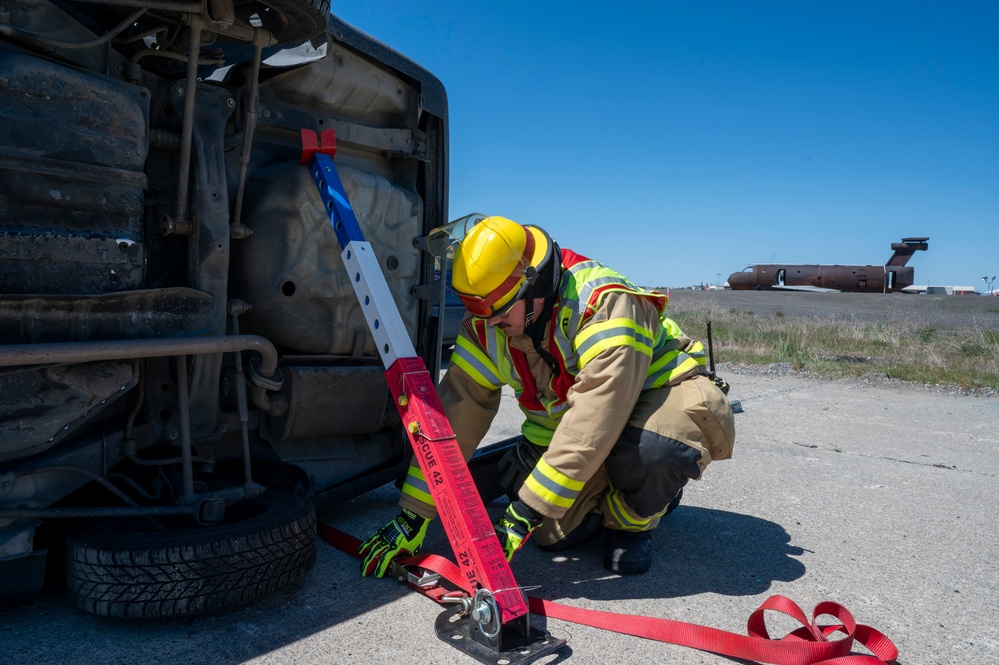 Fairchild AFB firefighters respond to a simulated emergency