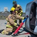 Fairchild AFB firefighters respond to a simulated emergency