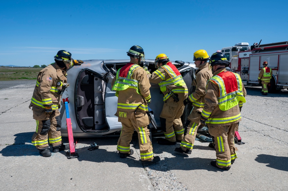 Fairchild AFB firefighters respond to a simulated emergency