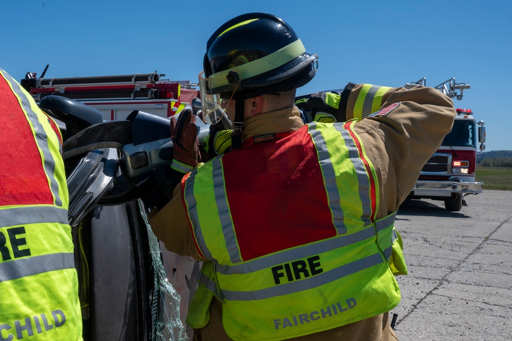 Fairchild AFB firefighters respond to a simulated emergency