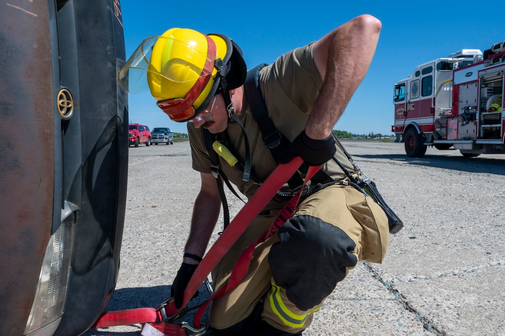 Fairchild AFB firefighters respond to a simulated emergency