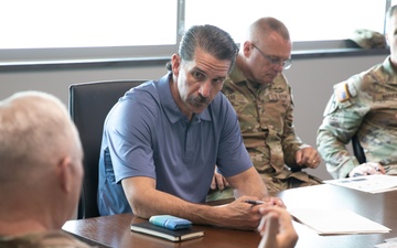 Kentucky National Guard leaders brief new civilian aide to the Secretary of the Army during Frankfort visit