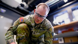 Sgt. 1st Class Tyler Tyler Baumgartner operates a homemade simulator during Chimera Sunrise