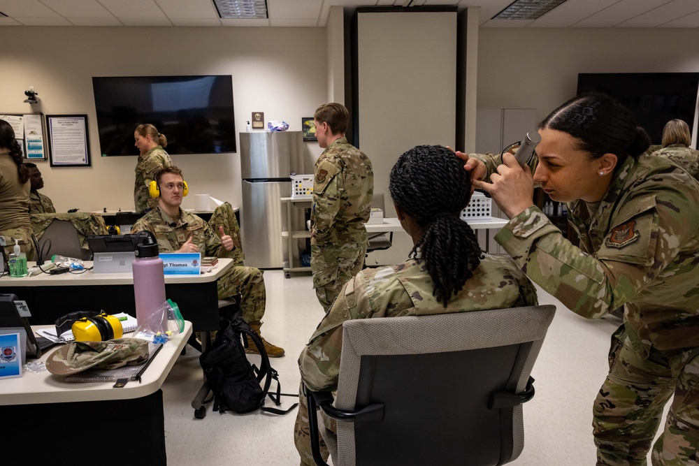 USAFSAM students practice hearing conservation techniques