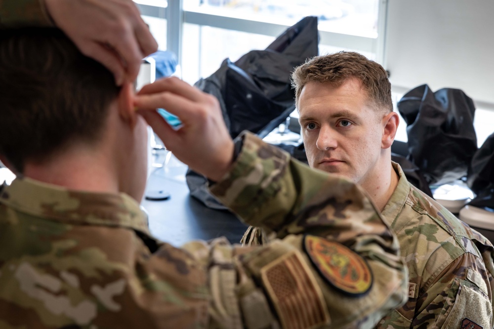USAFSAM students practice hearing conservation techniques