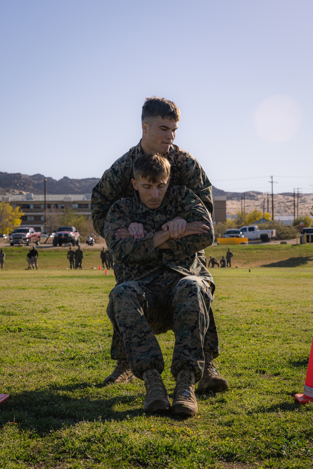 Back to back: Marines with MAIC 75-23 run CFT on day two