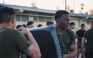 Marines make waves while shallow water grappling during MAIC 73-25