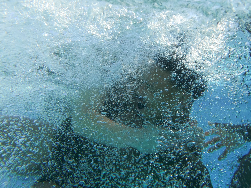 Marines make waves while shallow water grappling during MAIC 73-25