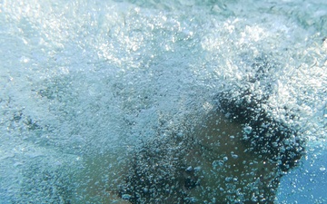 Marines make waves while shallow water grappling during MAIC 73-25