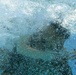 Marines make waves while shallow water grappling during MAIC 73-25