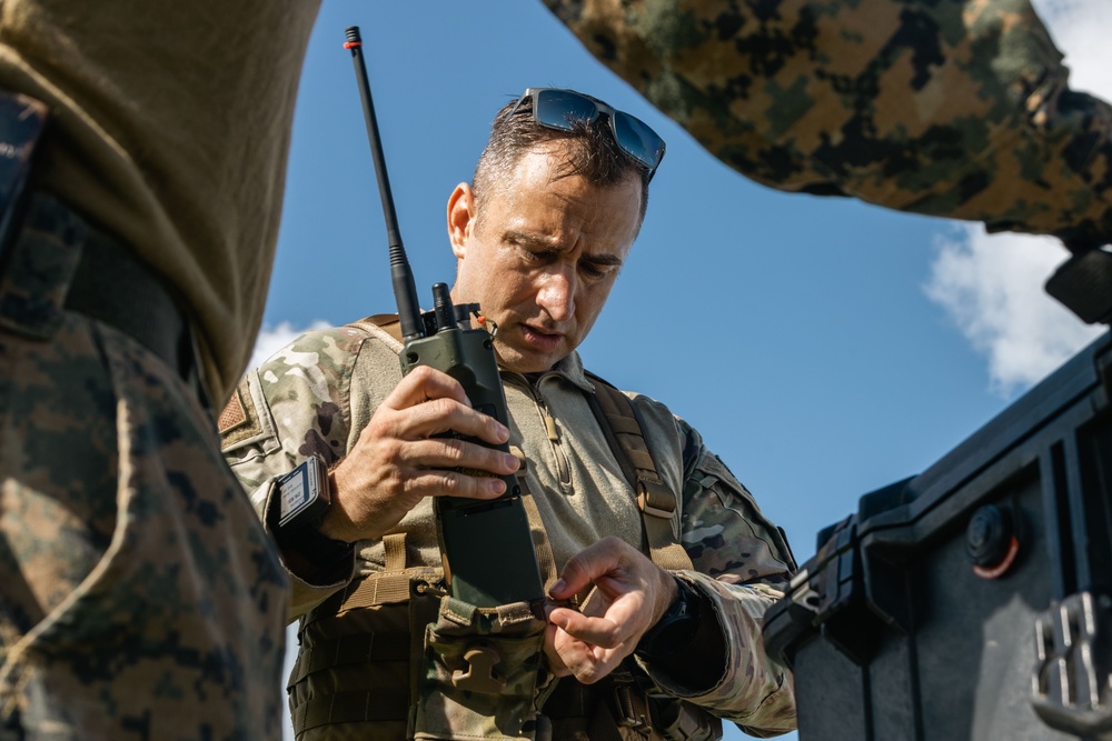 MRF-D 25.3: U.S. service members receive an air delivery