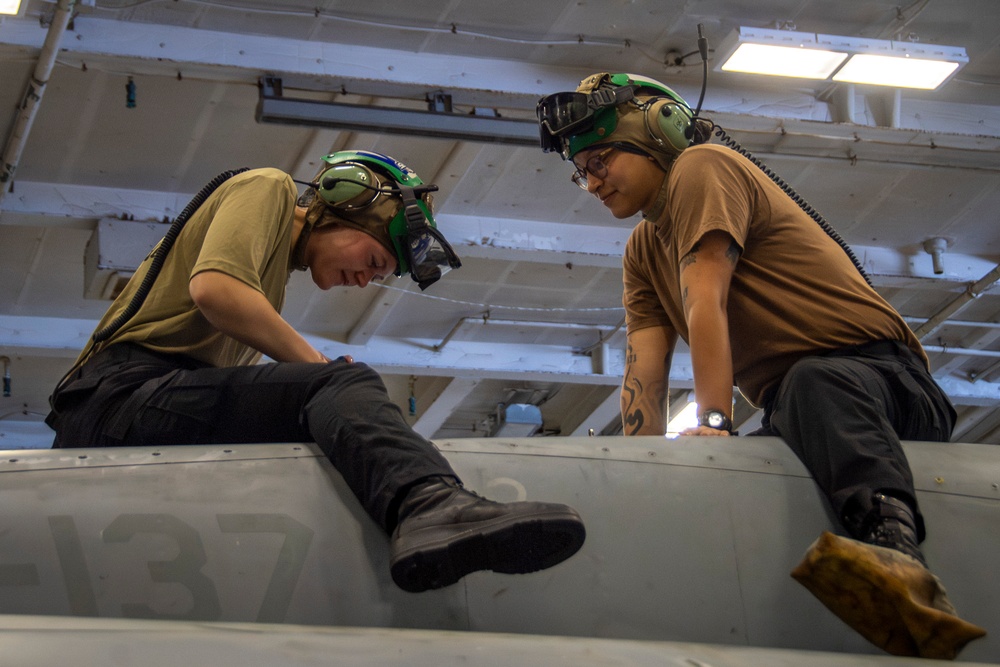 Nimitz Sailors Conduct Maintenance on Aircraft