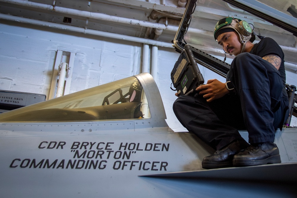 Nimitz Sailors Conduct Maintenance on Aircraft