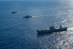 Blue Ridge conducts a maneuvering exercise with French ships