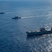 Blue Ridge conducts a maneuvering exercise with French ships
