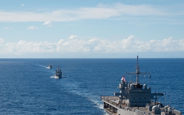 Blue Ridge conducts a maneuvering exercise with French ships