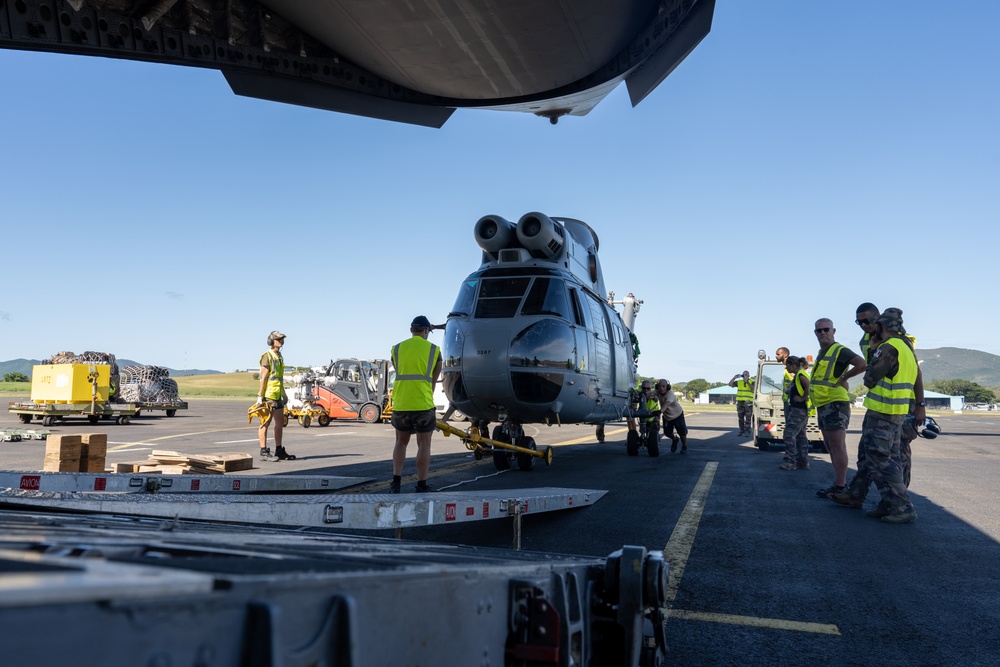 JBER aircrew, French Army work together to load Puma helicopter onto C-17