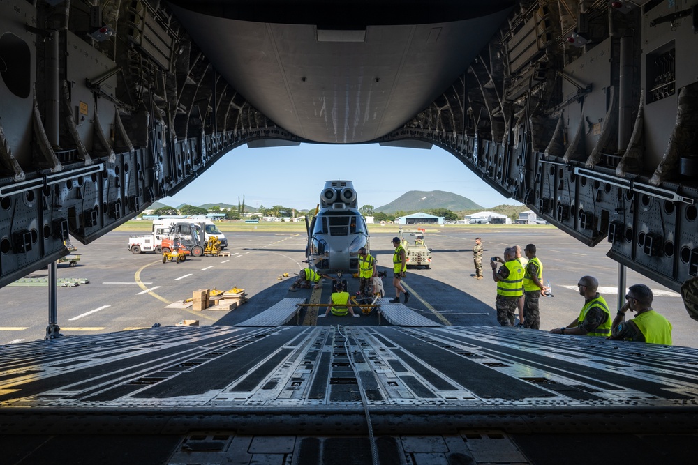 JBER aircrew, French Army work together to load Puma helicopter onto C-17