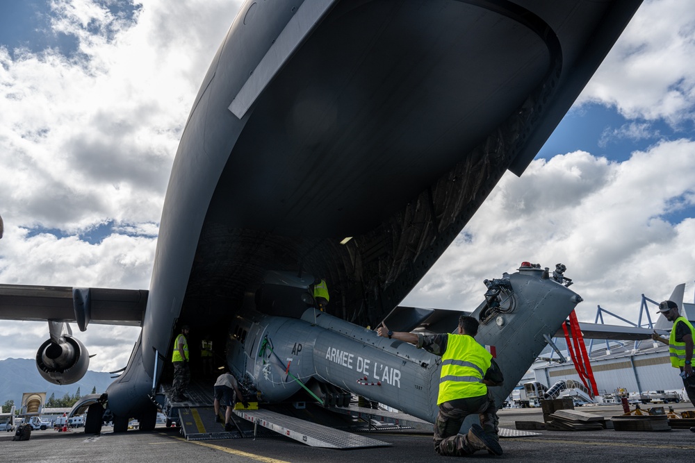 JBER aircrew, French Army work together to load Puma helicopter onto C-17